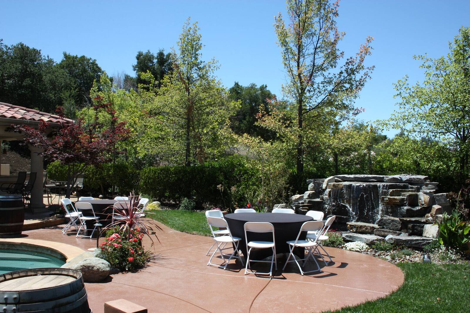 The hillside waterfall beside the main gathering terrace.